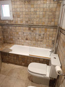 En suite bathroom next to main bedroom